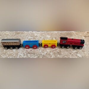 4 wooden train cars (including engine) compatible with Brio and Thomas